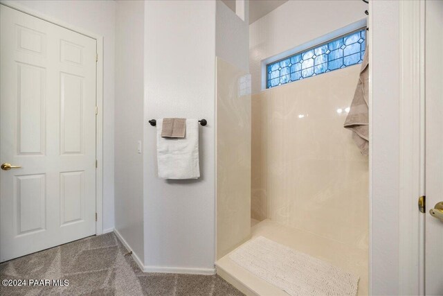 bathroom featuring walk in shower