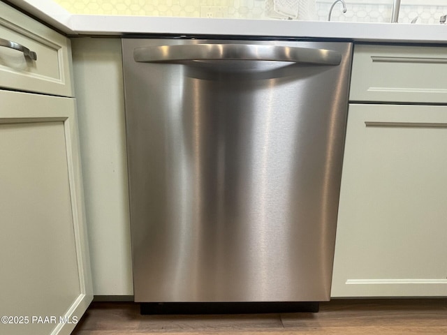 room details with dishwasher and wood finished floors