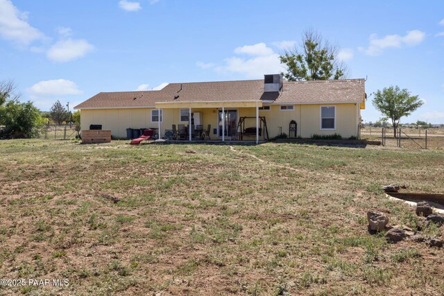 25820 N Poppy Dr, Paulden, AZ 86334 - back of house featuring a patio and board and batten siding