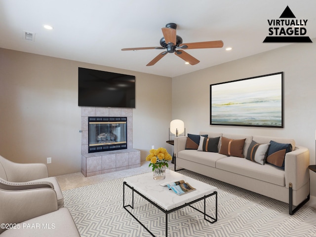 5700 N Concho Dr, Prescott Valley, AZ 86314 - living room with ceiling fan, recessed lighting, a tiled fireplace, and carpet
