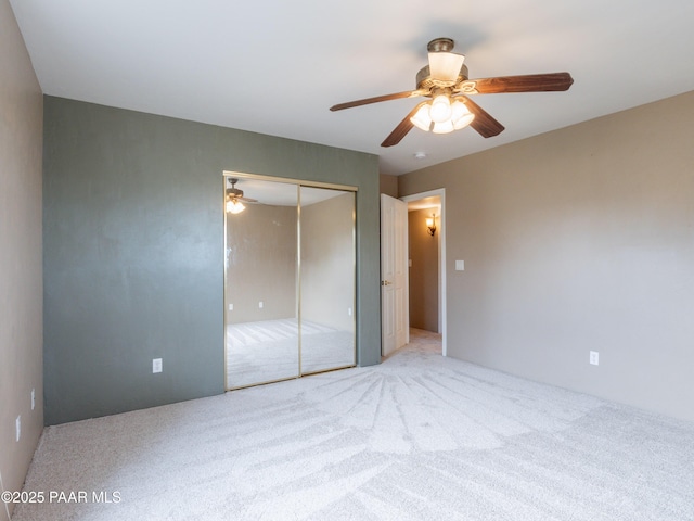 5700 N Concho Dr, Prescott Valley, AZ 86314 - unfurnished bedroom with carpet floors, a closet, and a ceiling fan