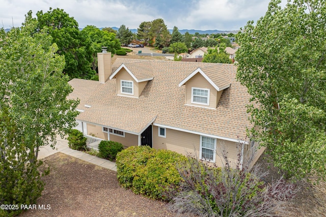 5700 N Concho Dr, Prescott Valley, AZ 86314 - view of front of home featuring a chimney and roof with shingles
