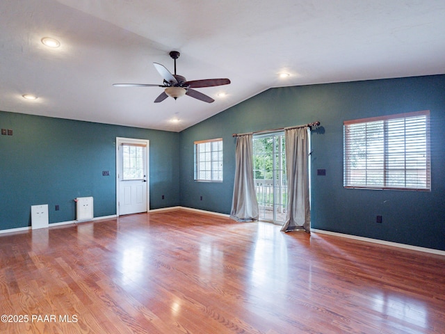 5700 N Concho Dr, Prescott Valley, AZ 86314 - spare room featuring ceiling fan, vaulted ceiling, wood finished floors, baseboards, and recessed lighting