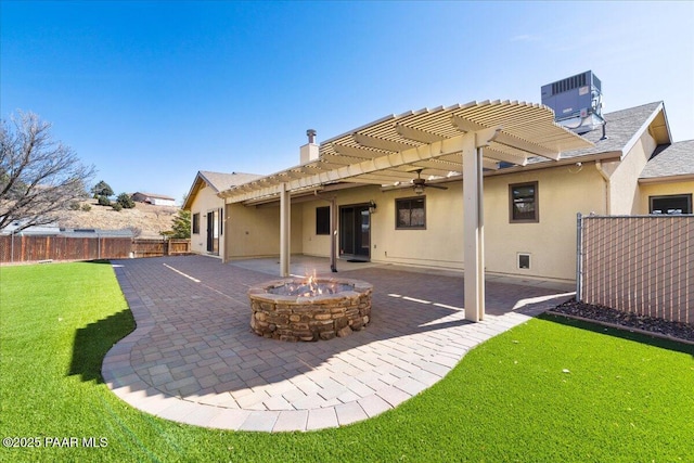 rear view of house featuring a fire pit, a fenced backyard, cooling unit, a pergola, and stucco siding