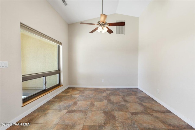 empty room with visible vents, a ceiling fan, stone finish floor, vaulted ceiling, and baseboards