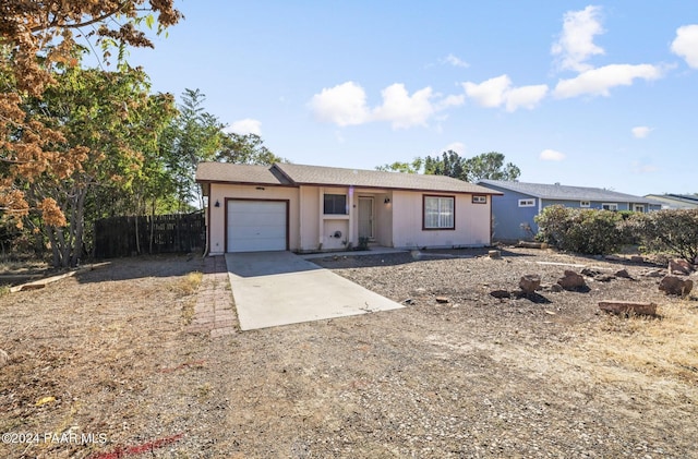 ranch-style house with a garage