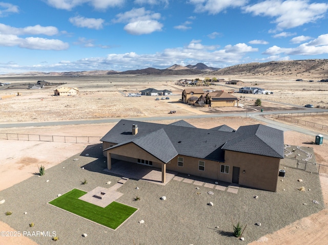 bird's eye view with a mountain view