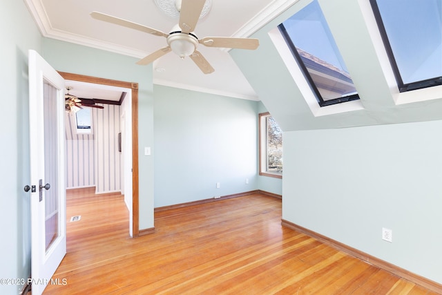 bonus room featuring hardwood / wood-style flooring and ceiling fan