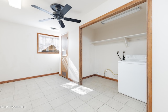 laundry room featuring ceiling fan, washer / dryer, and light tile patterned floors