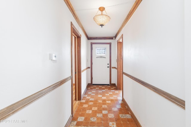 corridor featuring ornamental molding