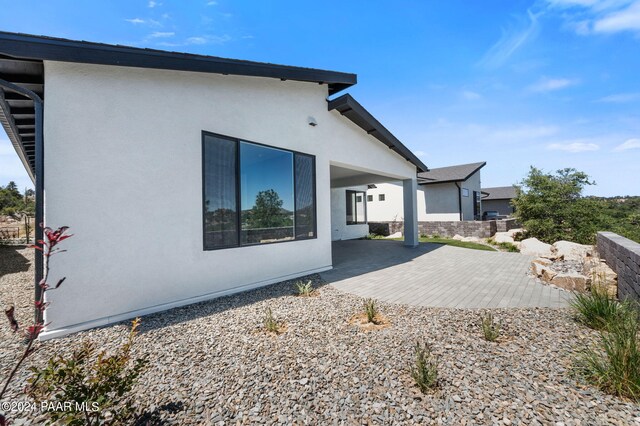 back of house featuring a patio area