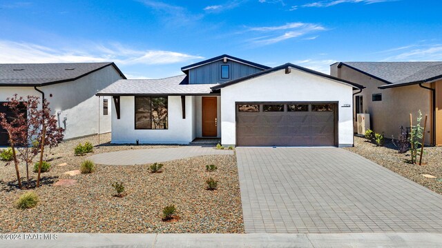 view of front of home featuring a garage