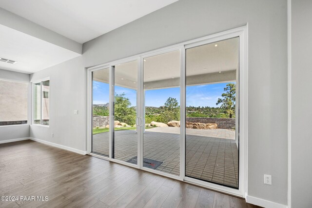 doorway featuring hardwood / wood-style flooring