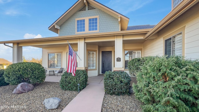 property entrance with a porch