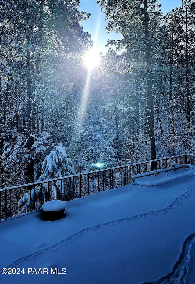 view of snow covered patio