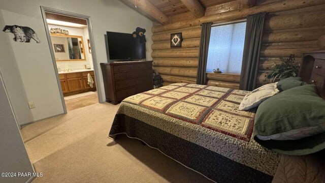 bedroom with light carpet, ensuite bathroom, wood ceiling, log walls, and beam ceiling