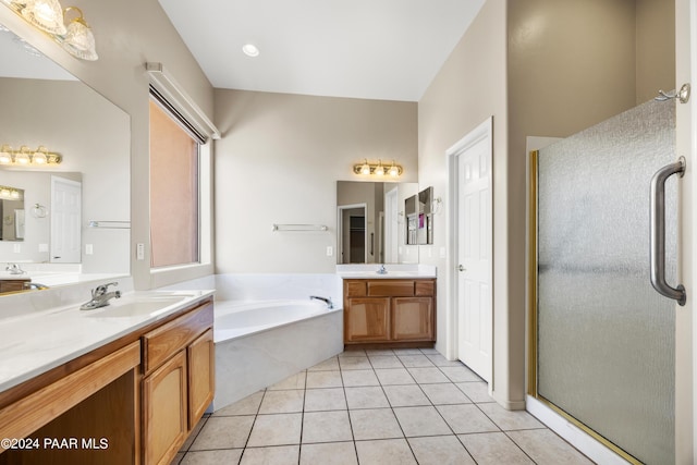 bathroom with separate shower and tub, tile patterned flooring, and vanity