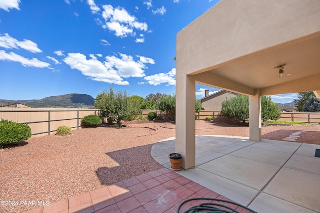 view of patio / terrace with a mountain view