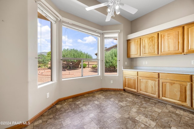 kitchen featuring ceiling fan