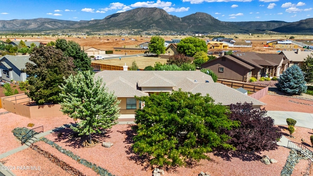 drone / aerial view featuring a mountain view