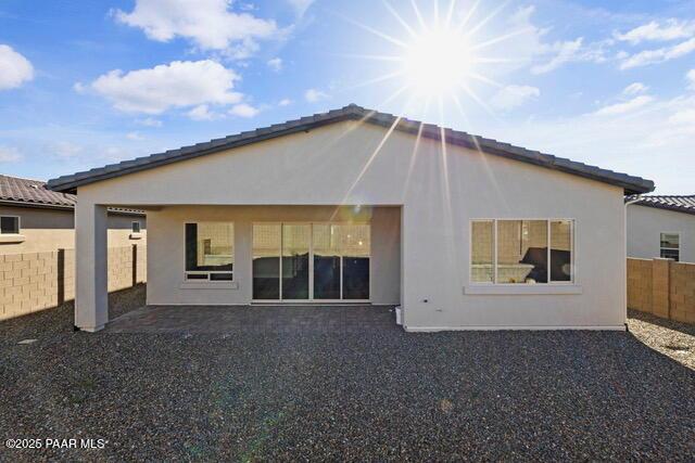 7064 N Robin Nest Ct, Prescott Valley, AZ 86315 - back of property featuring stucco siding and a patio area