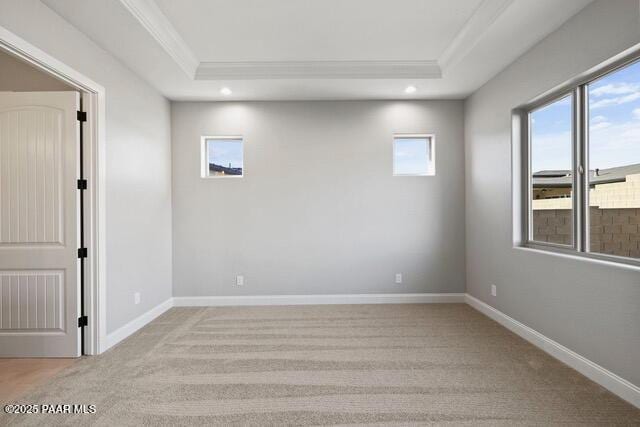 7064 N Robin Nest Ct, Prescott Valley, AZ 86315 - spare room featuring a raised ceiling, light carpet, ornamental molding, and recessed lighting