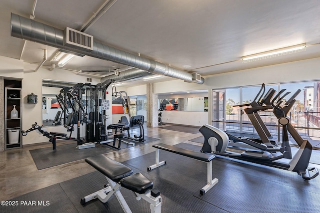 exercise room featuring visible vents
