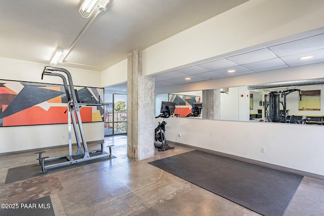 workout room featuring baseboards and recessed lighting