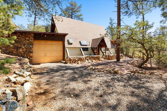 2308 W Mountain Laurel Rd, Prescott, AZ 86303 - view of front facade with an attached garage and driveway
