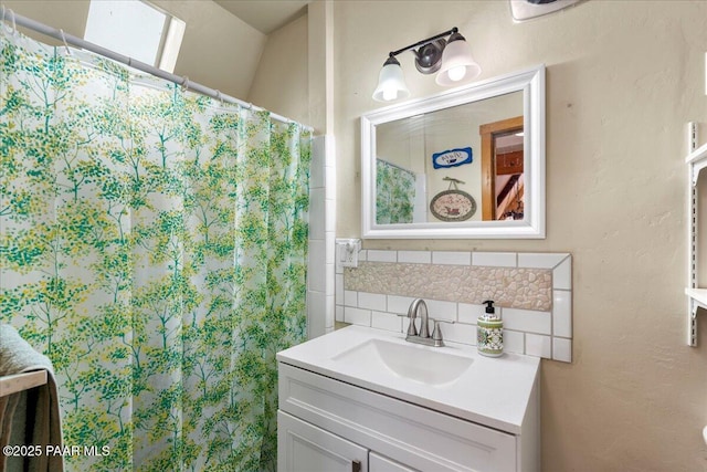 2308 W Mountain Laurel Rd, Prescott, AZ 86303 - bathroom featuring decorative backsplash, vanity, and a shower with shower curtain