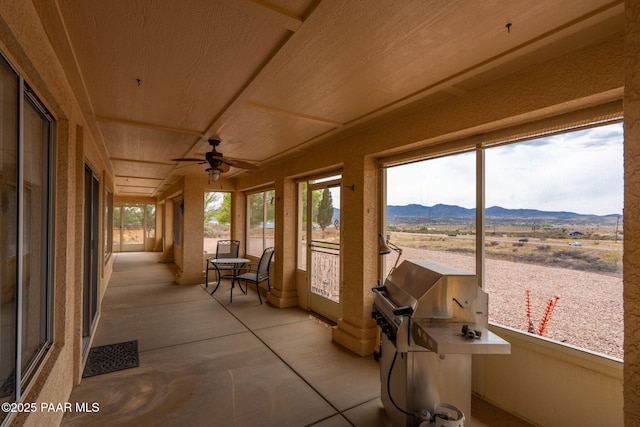 14705 E State Route 169, Dewey-Humboldt, AZ 86327 - sunroom / solarium featuring a mountain view and a ceiling fan