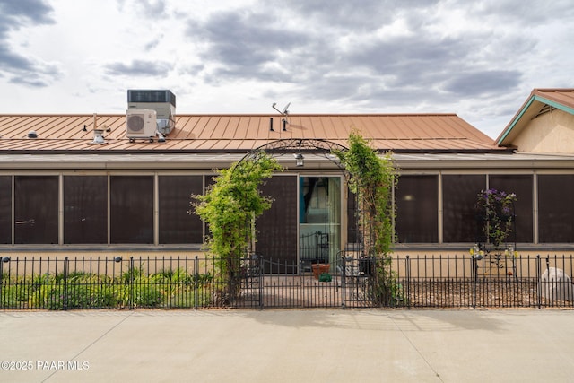 14705 E State Route 169, Dewey-Humboldt, AZ 86327 - view of front of property featuring a sunroom, a standing seam roof, and fence