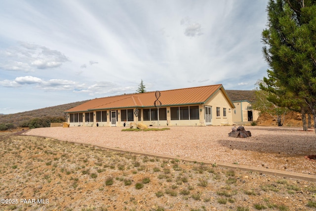 14705 E State Route 169, Dewey-Humboldt, AZ 86327 - back of property with metal roof, a sunroom, and stucco siding