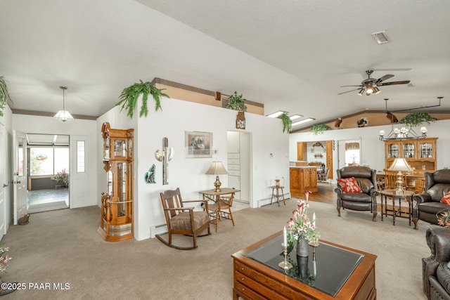 14705 E State Route 169, Dewey-Humboldt, AZ 86327 - living room featuring light colored carpet, lofted ceiling, a ceiling fan, and a baseboard heating unit