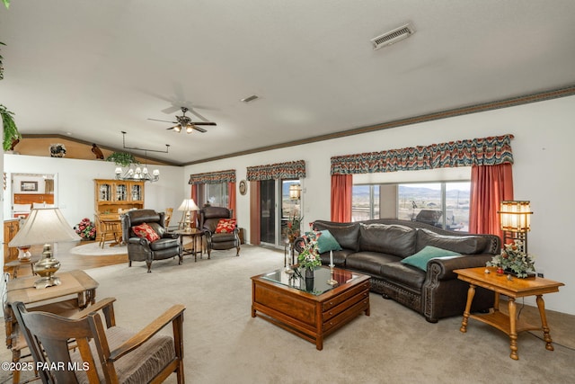 14705 E State Route 169, Dewey-Humboldt, AZ 86327 - living area with carpet floors, ceiling fan, lofted ceiling, and a chandelier
