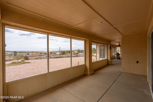 14705 E State Route 169, Dewey-Humboldt, AZ 86327 - unfurnished sunroom with concrete floors