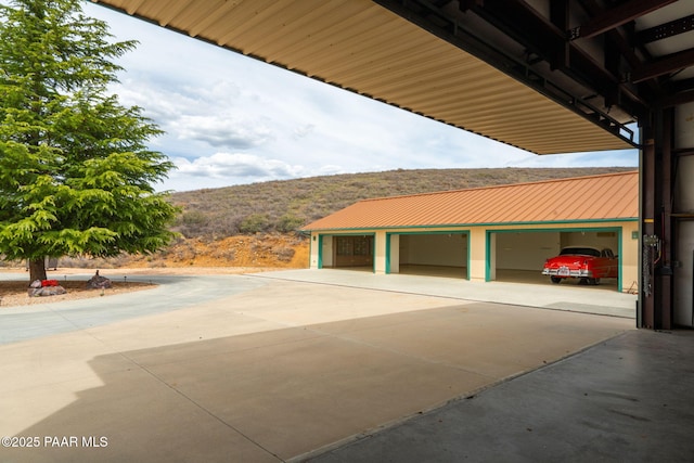 14705 E State Route 169, Dewey-Humboldt, AZ 86327 - view of patio / terrace featuring a mountain view and a garage