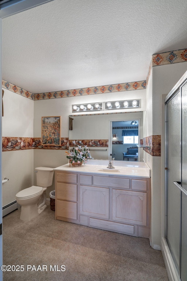 14705 E State Route 169, Dewey-Humboldt, AZ 86327 - bathroom with a stall shower, vanity, a baseboard radiator, a textured ceiling, and toilet