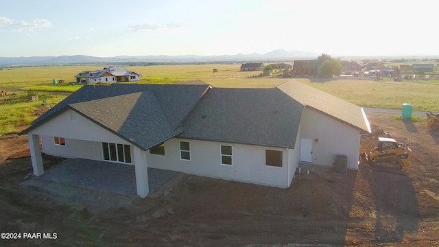 drone / aerial view featuring a mountain view