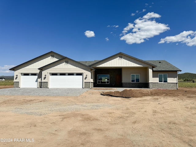 view of front of property featuring a garage