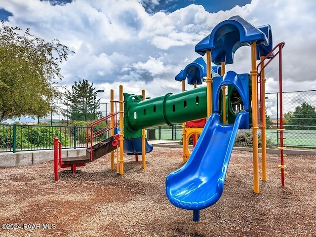 community playground featuring fence