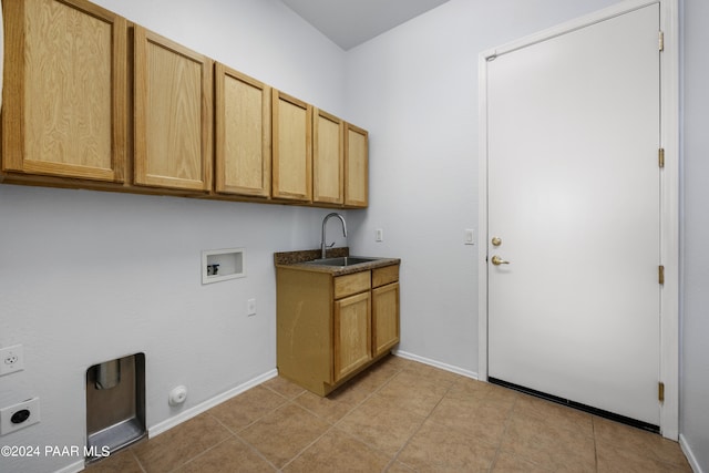 laundry area featuring hookup for a washing machine, hookup for an electric dryer, hookup for a gas dryer, a sink, and cabinet space