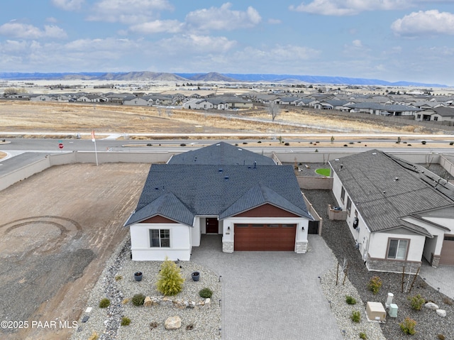 birds eye view of property with a residential view