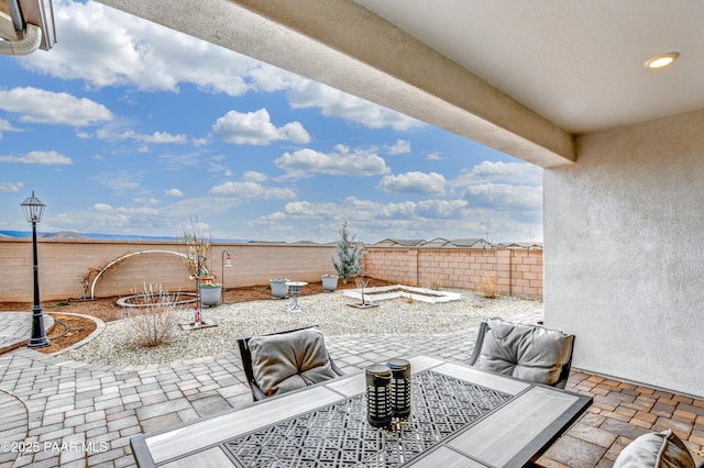 view of patio with a fenced backyard