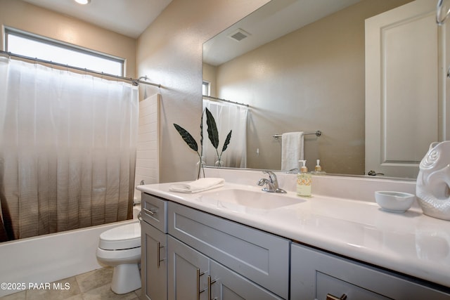 bathroom featuring vanity, visible vents, shower / tub combo, tile patterned floors, and toilet