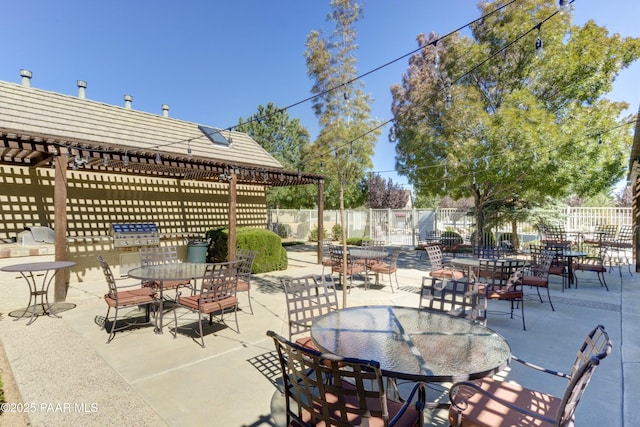 view of patio / terrace with outdoor dining area, a pergola, and fence