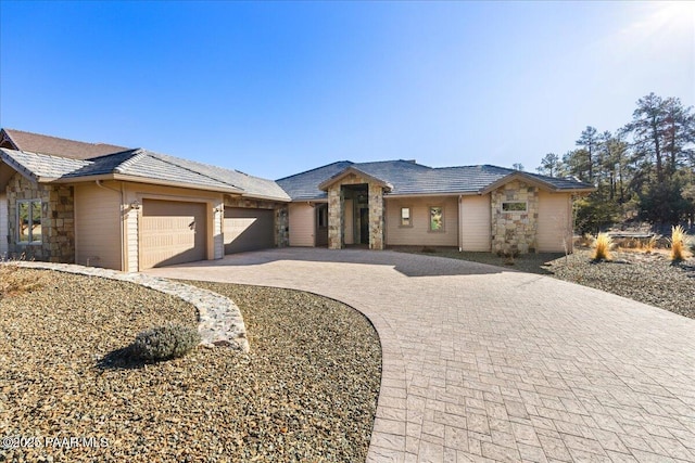 view of front of home with a garage