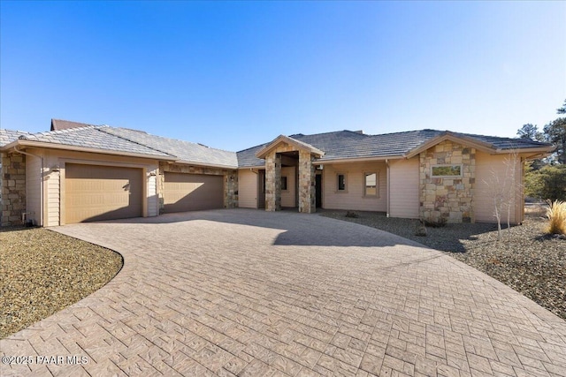 view of front of property featuring a garage