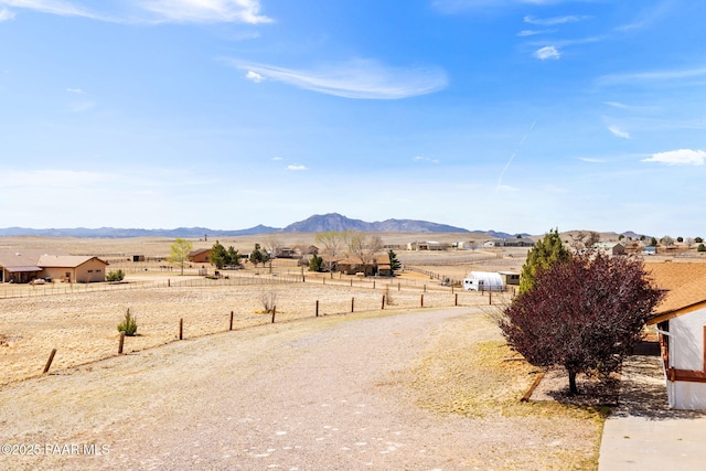 property view of mountains featuring a rural view