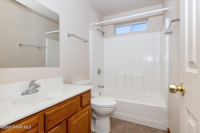 full bathroom with tile patterned floors, vanity, toilet, and shower / tub combination